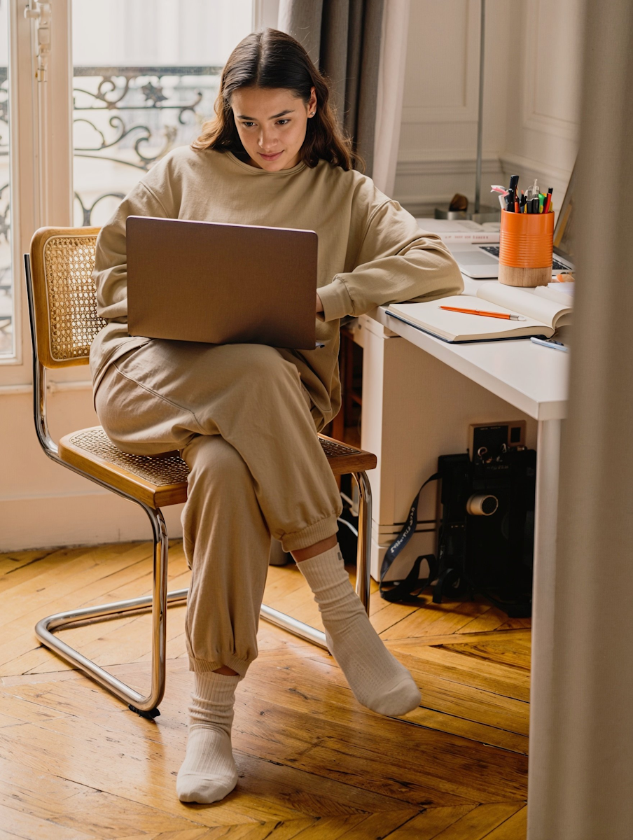 woman working by window